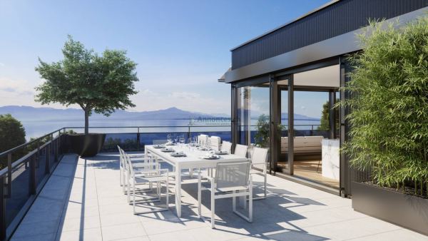 UNIQUE! Attique de 5.5 pièces de 180m2 bénéficiant d'un rooftop terrasse de 168m2 avec vue panoramique sur le lac et les Alpes
